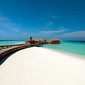constance moofushi resort maldives water villa walkway