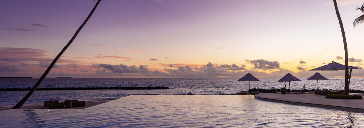 Baglioni Resort Maldives pool sunset