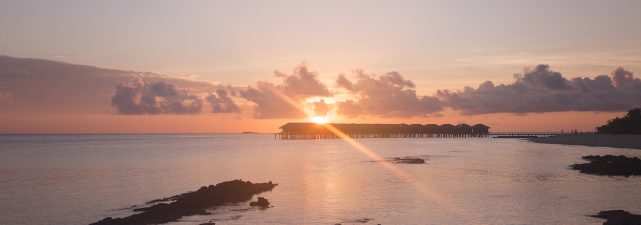 Filitheyo Island Resort Maldives sunset water villas
