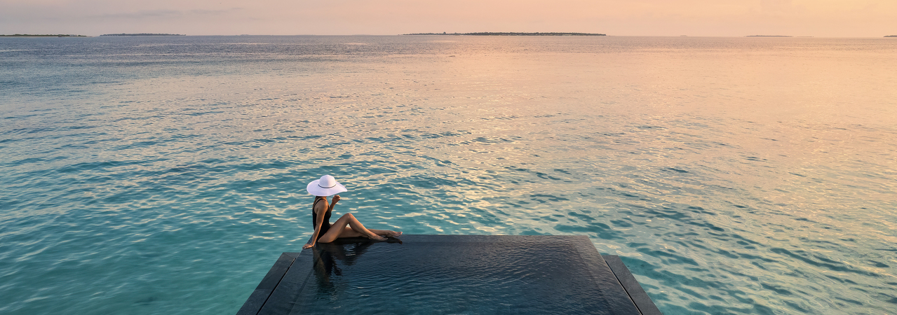 Joali Being Resort Maldives infinity pool ocean sunset