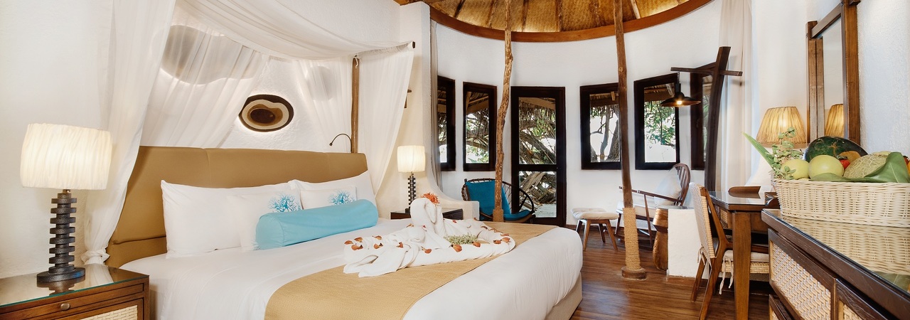 Makunudu Island resort maldives Deluxe Bungalow Bedroom