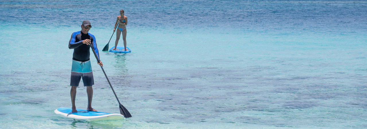 Makunudu Island resort maldives water sports 2 SUP stand up paddle board
