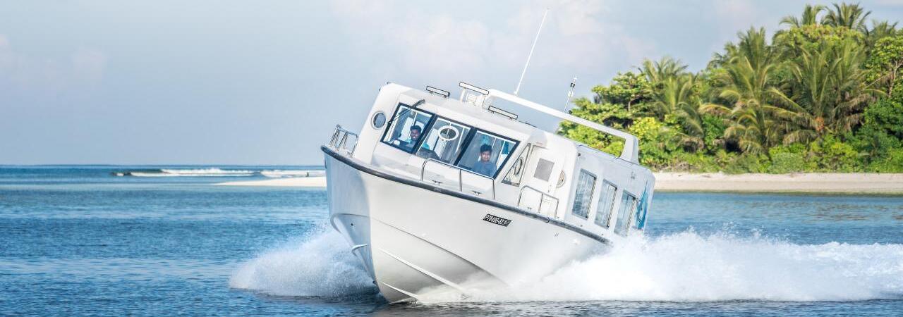 Medhufushi resort Maldives speedboat transfer