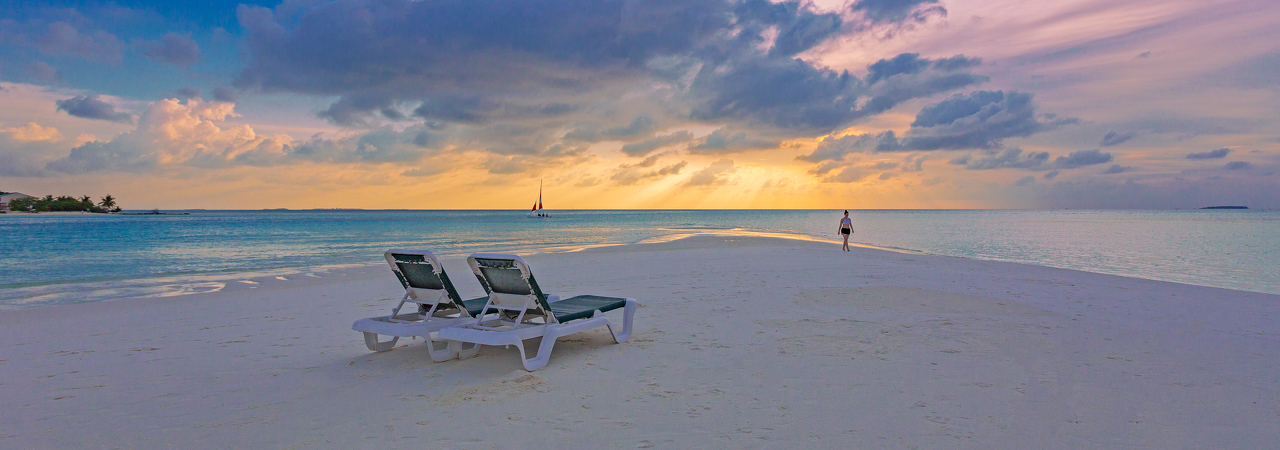 Meeru Island Resort Maldives beach sunset