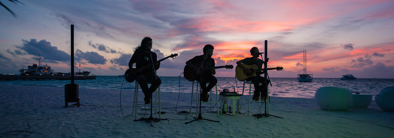 Meeru Island Resort Maldives live music sunset beach