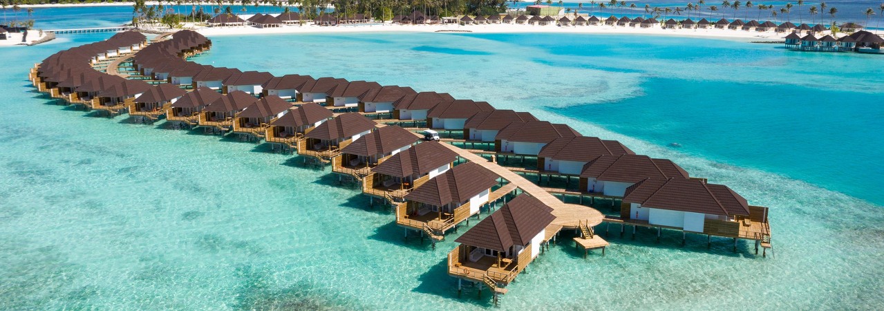 The Sun Siyam Olhuveli resort Maldives aerial water villas