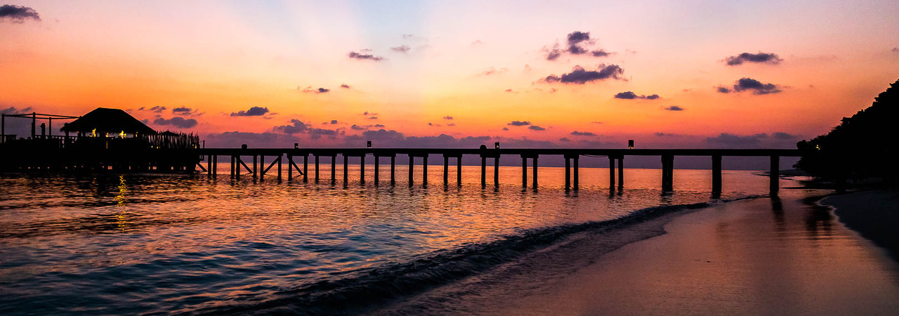 Soneva Fushi resort Maldives sunset
