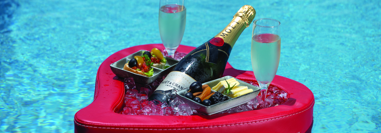 Varu by Atmosphere resort Maldives floating champagne