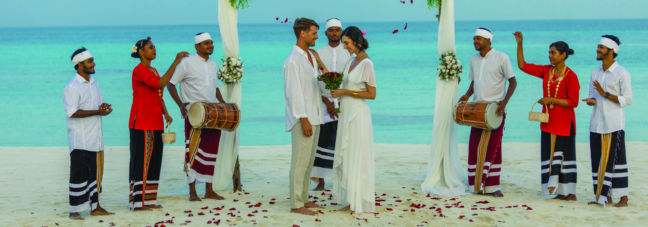 Varu by Atmosphere resort Maldives vow renewal ceremony wedding romantic setup