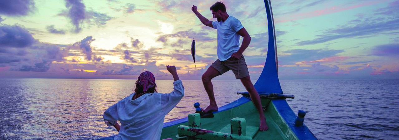Varu by Atmosphere resort Maldives sunset fishing dhoni