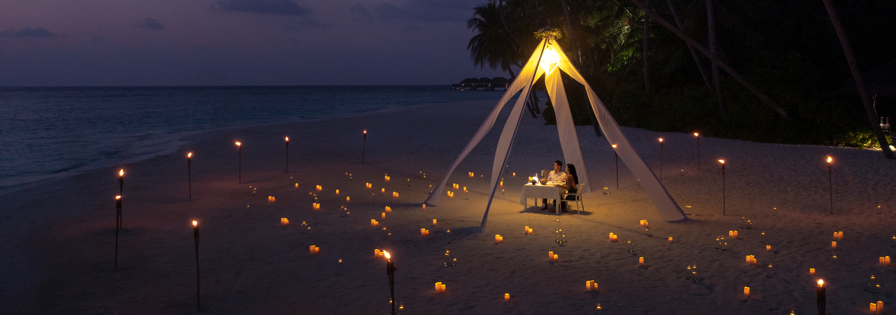 Velaa Private Island resort Maldives evening private beach setup dinner destination dining romantic