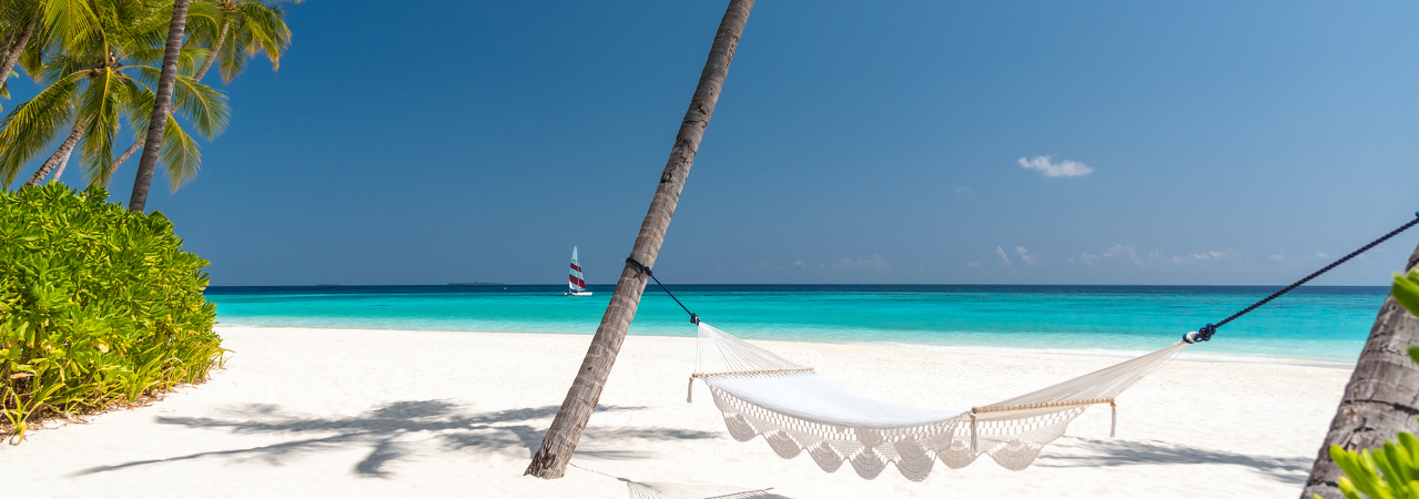 Velaa Private Island resort Maldives beach hammock
