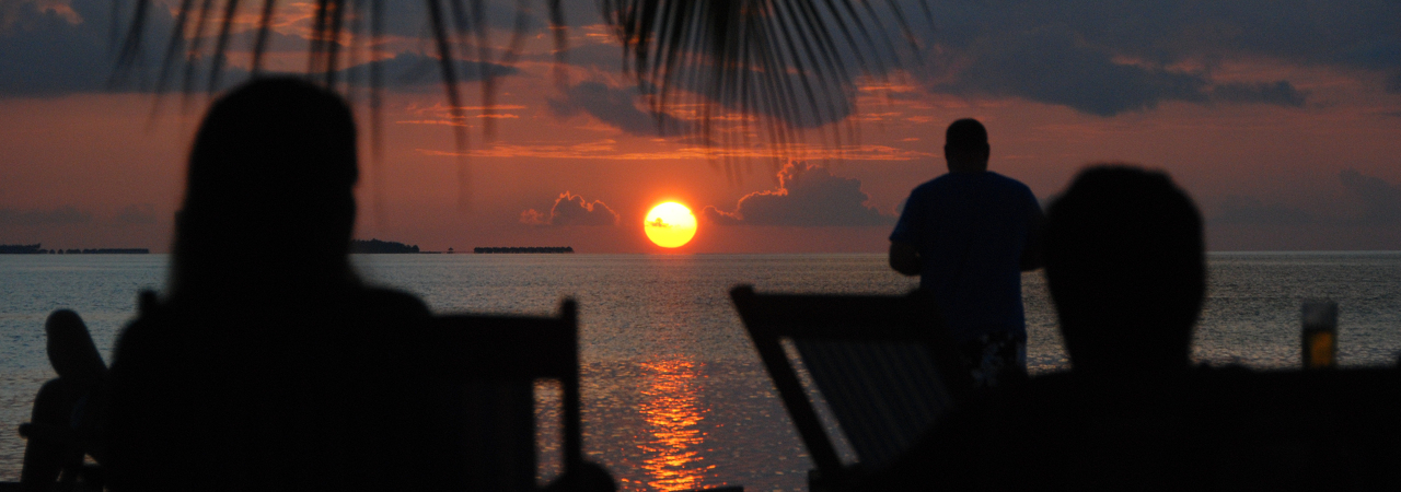 Vilamendhoo island resort maldives sunset